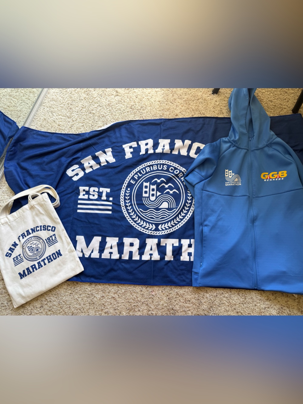 SF Marathon hoodie, tote, and towel